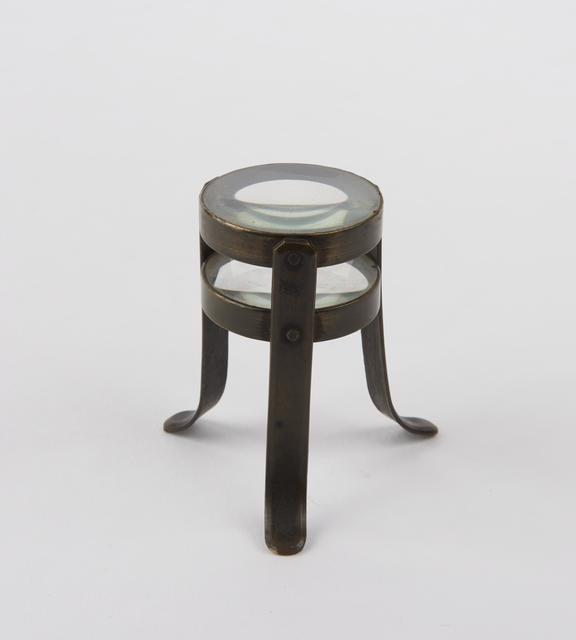 Magnifier formed from two convex lenses set between 3 legs of