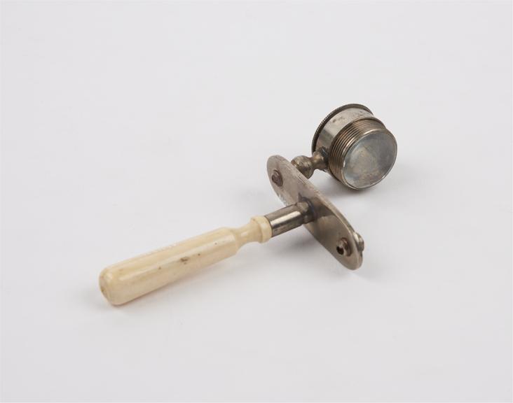 Hand microscope, with specimen holder missing, on ivory handle