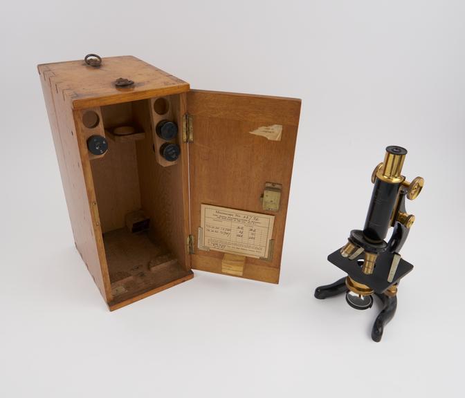 Kima model microscope and accessories by W. Watson and Sons Ltd