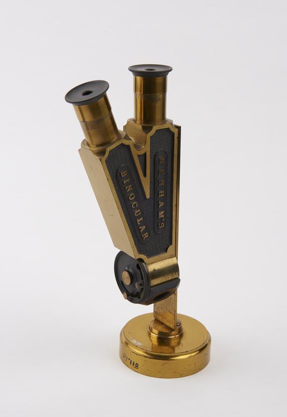 Wenham binocular body tube on manufacturer's display stand