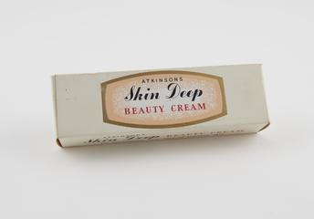 Cardboard packet containing tube of hand cream