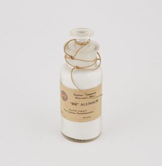 Bottle, containing Specimen R.R. Alundum