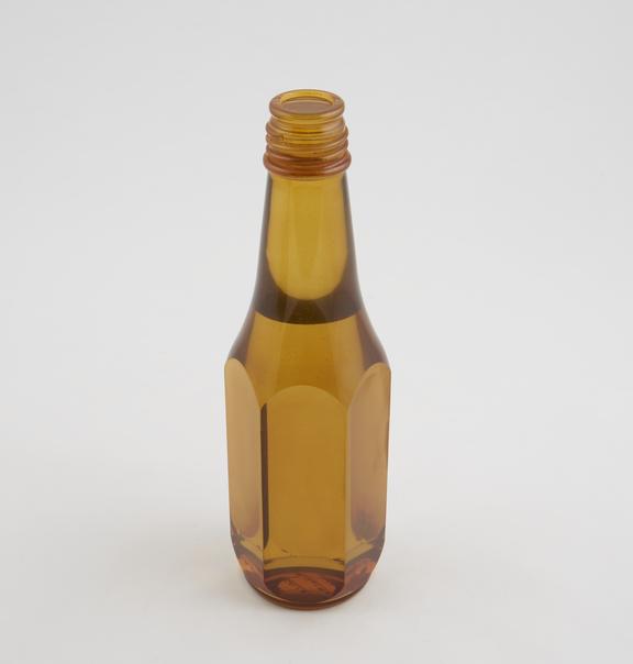 Model bottle in dyed perspex, used as an aid to bottle design