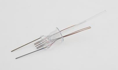 Glass with 7 wires running through it, part of a selection of glass to metal mis-matched seals, 1968