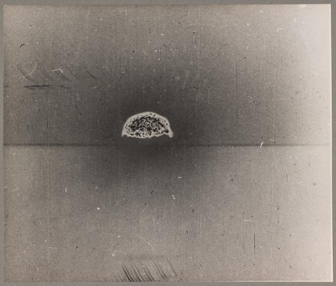 Black and white photographic print, 3rd of 8, showing the July 1945 New Mexico atomic bomb explosion test