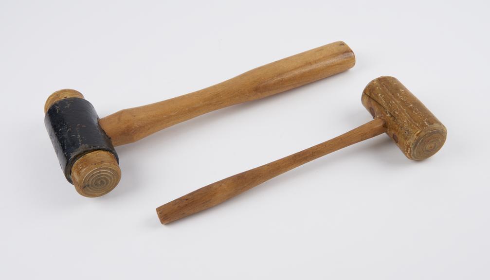 Two mallets, one marked: 'HK2'
