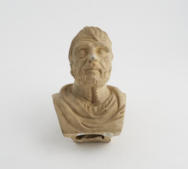 1 Plaster bust, sawn off pedestal, man bearded