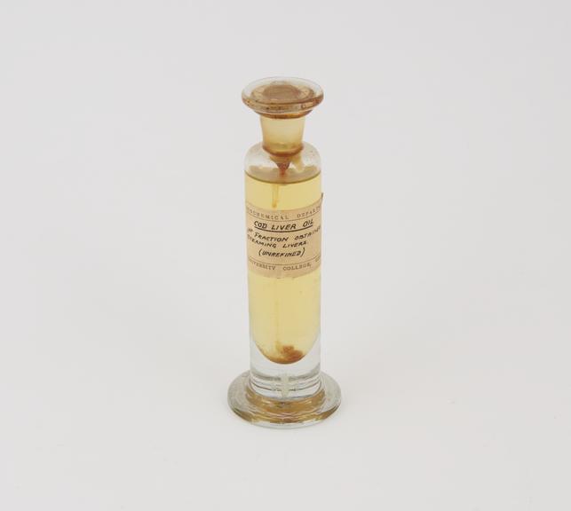 Specimen jar containing unrefined cod liver oil made by Sir Jack Cecil Drummond, c.1920