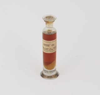 Specimen jar containing "rotted" cod liver oil made by Sir Jack Cecil Drummond, c.1920