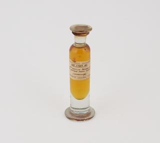 Specimen jar containing unrefined cod liver oil made by Sir Jack Cecil Drummond, c.1920