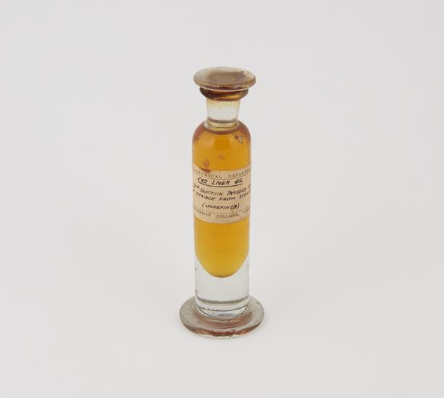 Specimen jar containing unrefined cod liver oil made by Sir Jack Cecil Drummond, c.1920