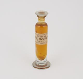 Specimen jar containing cod liver oil made by Sir Jack Cecil Drummond c.1920