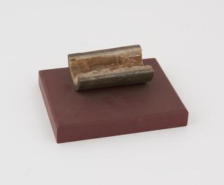 Sectioned pipe,to show hard water scale.