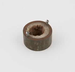 Sectioned pipe,showing hard water scale