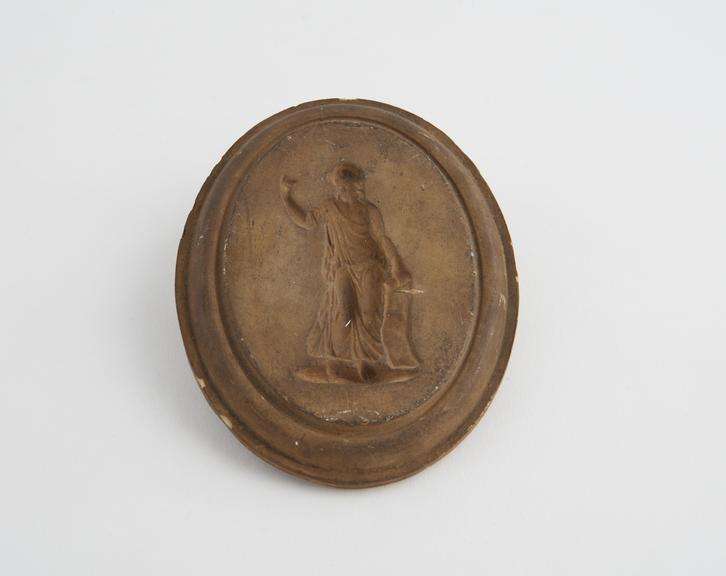 1 Plaster mould, woman standing left hand raised