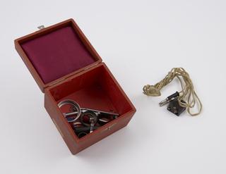 Box, containing microscope accessories