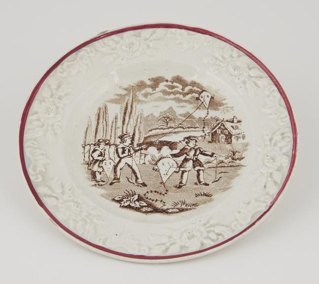 One sweetmeat plate in sepia, edge lined red.   6 1/2