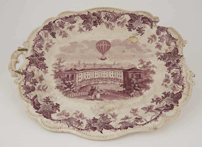 One large dish with handles (one broken off) in white and sepia