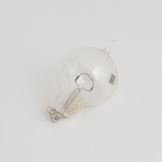 One of eighty-six early incandescent lamps.  Short and filament