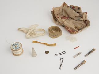 Lacemaker's bobbins and parchments.