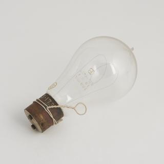 One of eighty-six early incandescent lamps.  Bambo