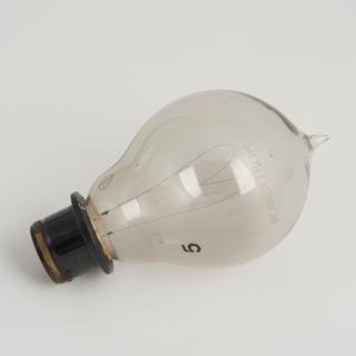 One of eighty-six early incandescent lamps. Carbon filament lamp