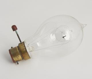 One of eighty-six early incandescent lamps. Two single loop filaments