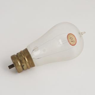 One of eighty-six early incandescent lamps. Carbon filament lamp