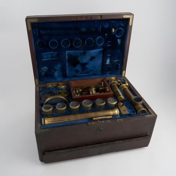 Eyepieces and other accessories in mahogany case with drawer