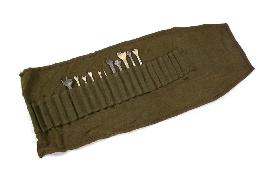 woodworking tool parts; roll of bits made from green cloth