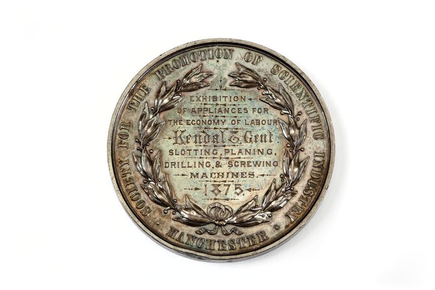 A medallion awarded to Kendall & Gent Limited by the Society