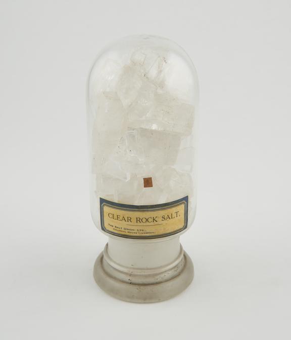 Specimen clear rock salt from mine in glass jar