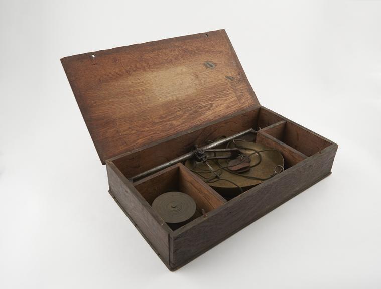 Pair of scales with weights, in oak case (scales)