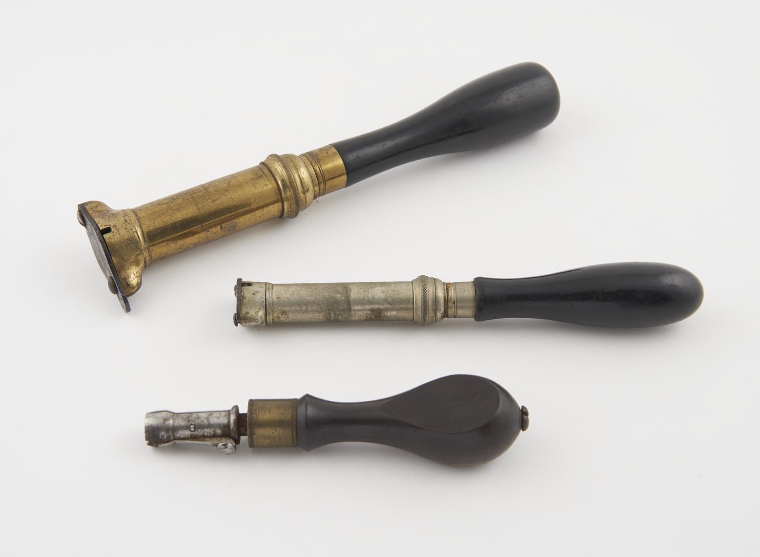 Thompson Powder Measure Three powder measures | Science Museum Group Collection