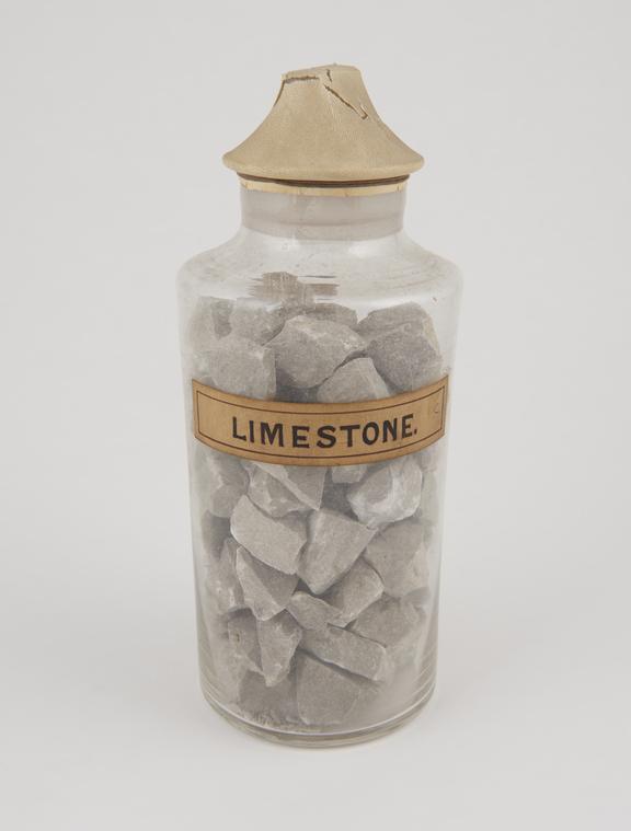 Bottle containing limestone.