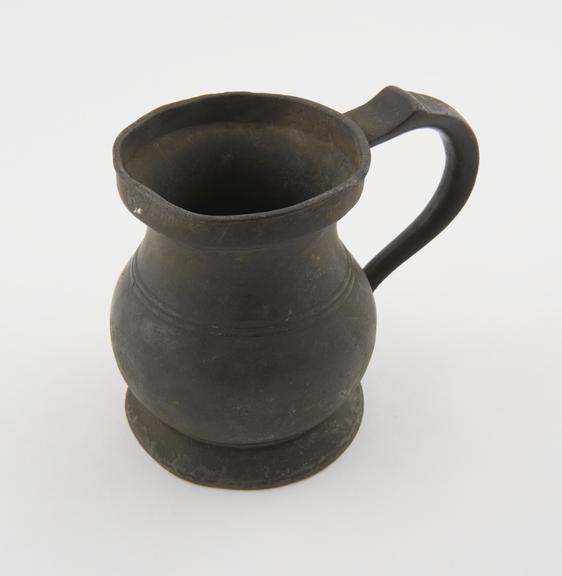 Metal jug with handle