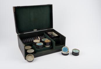 Case and records for Lioret spring motor driven phonograph No. 2