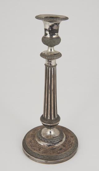 One of pair, silver candlesticks