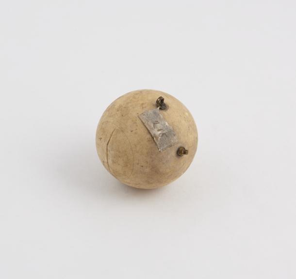 Ivory sphere, 6oz troy, with 2 brass hooks