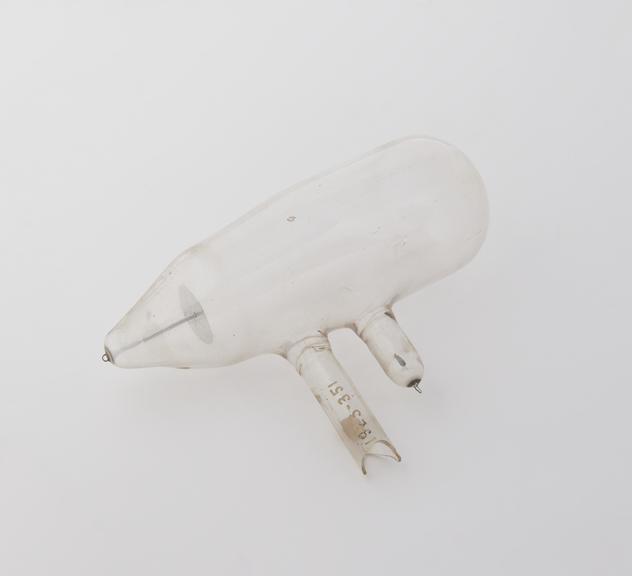 Small pear shaped x-ray tube of English manufacture, on stand