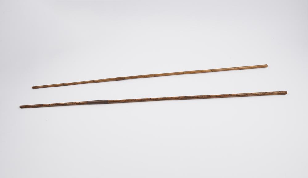 Two cloth yard sticks