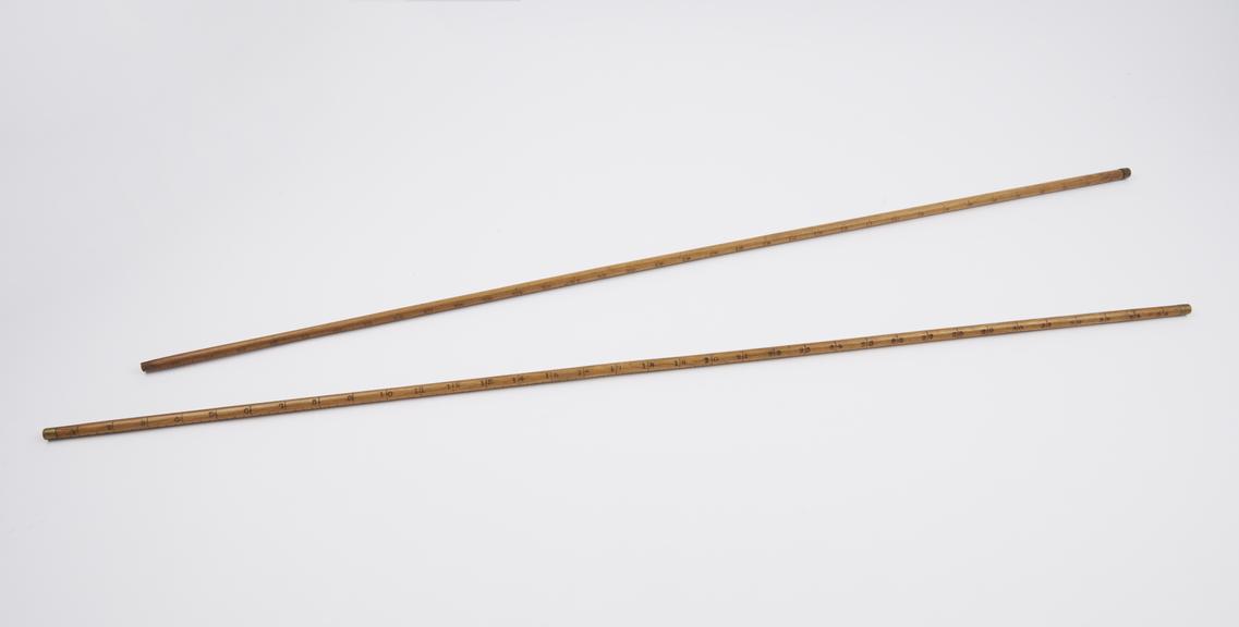 Two wooden Yard sticks