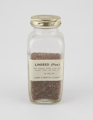 Specimen bottle containing linseed
