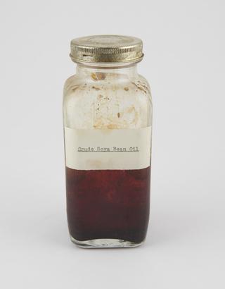 Specimen bottle containing soya bean oil