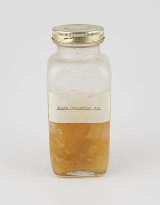 Specimen bottle containing groundnut oil