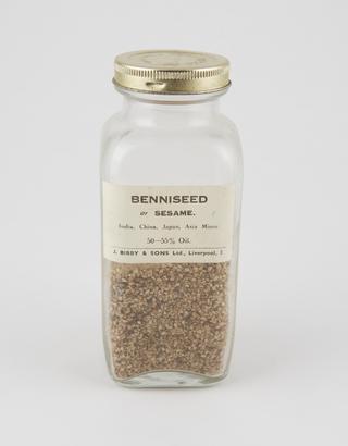 Specimen bottle containing sesame seeds