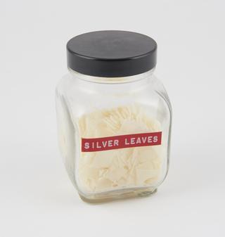 Jar of silver leaves soap flakes