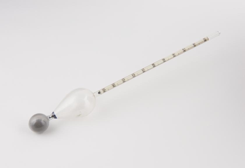 Glass hydrometer by Hicks. Mercury weight and paper scale