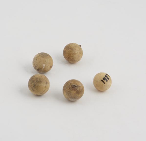 Six ivory balls