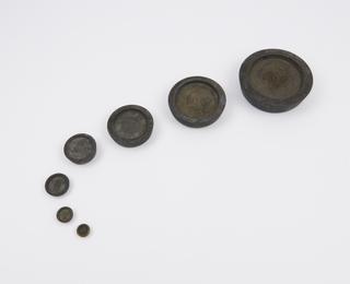 Set of 7 brass weights